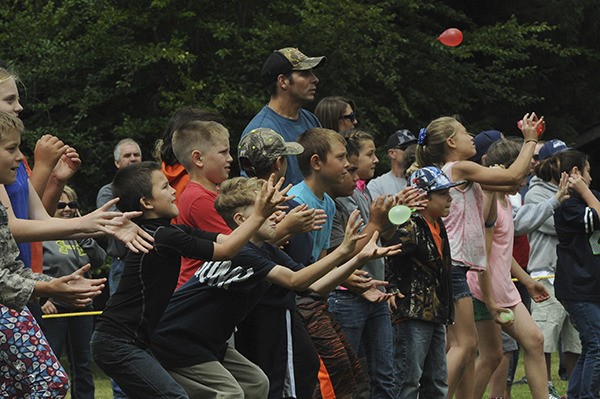 The balloon toss took place during the kids play day at Tillicum Park.