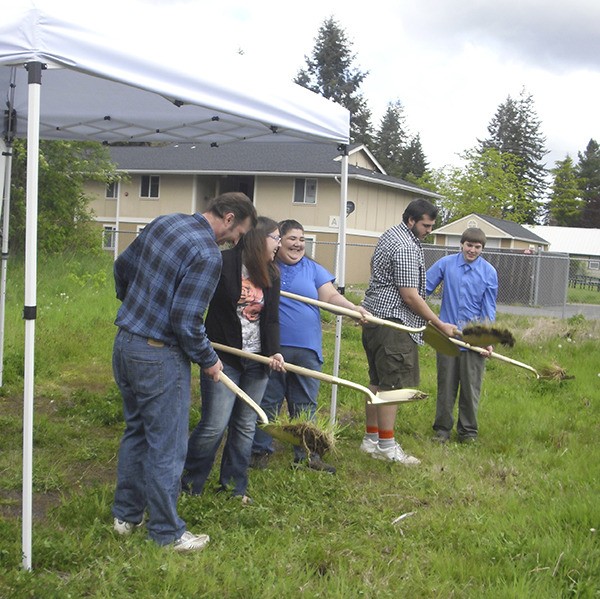 the Weaver family breaks-ground on the site for their new home.