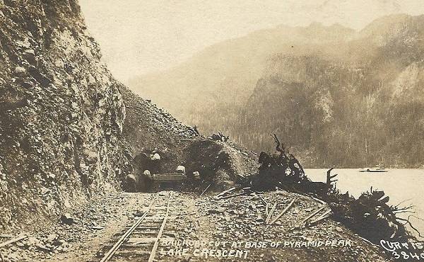 This postcard shows the original builders of the Spruce Railroad. A paddle wheel ferry boat can be seen on Lake Crescent. Forks Forum Archives