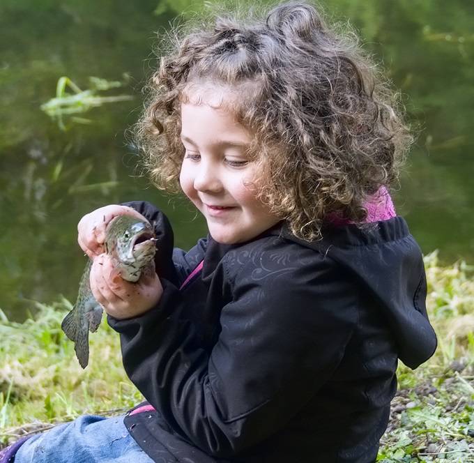 A girl and her fish! Photo David Youngberg