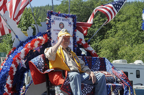 Jerry White, US Marine Corp 1954 - 1959 Okinawa, was honored as the chosen veteran to ride on the Forks Old Fashioned 4th of July Float during the Fun Days Grand Parade. White is also a long time Lions Club member serving 28 years with the group. Photo by Lonnie Archibald