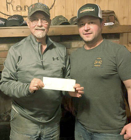 The Forks Lions Club recently donated a check for $500 to Green Beret Sam McElravy for the Forks VFW Post 9106 Gold Star Families Memorial Monument project. Seen here Sam on the left with Lions Club member Guy Ruble. Submitted photo