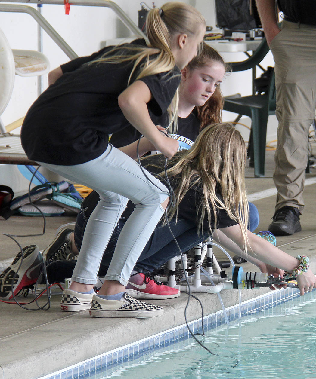 One of the Forks teams works to prepare their ROV for the next underwater task. Photos Christi Baron