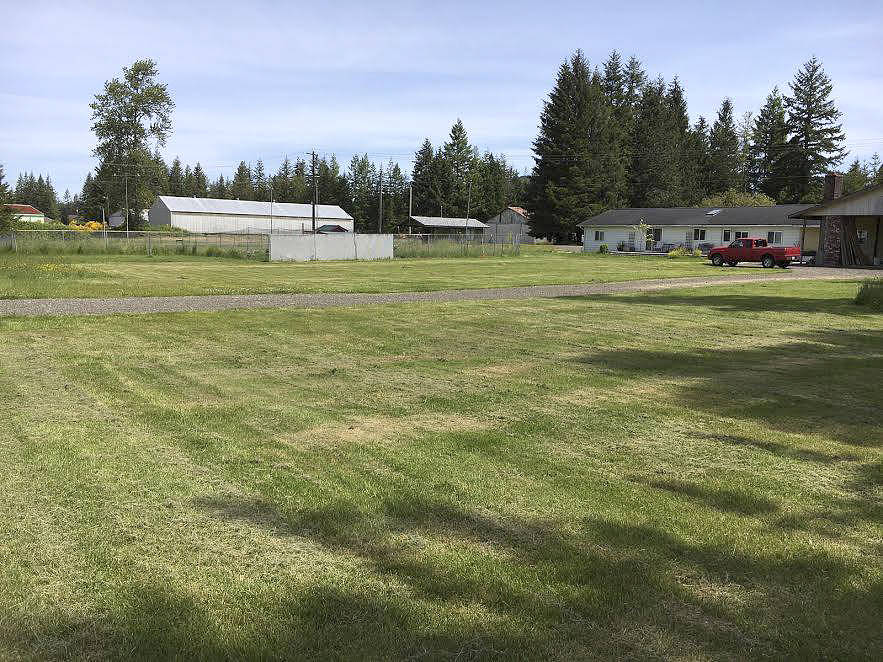 The proposed site for the Hobucket House sits across the street from Sarge’s Place on Ash Avenue.