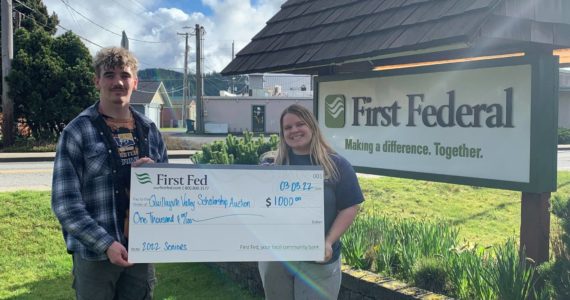 Seen here with the ‘big check’ are the 2022 student auction coordinators Hayden Queen and Nicole Winger. Submitted Photo