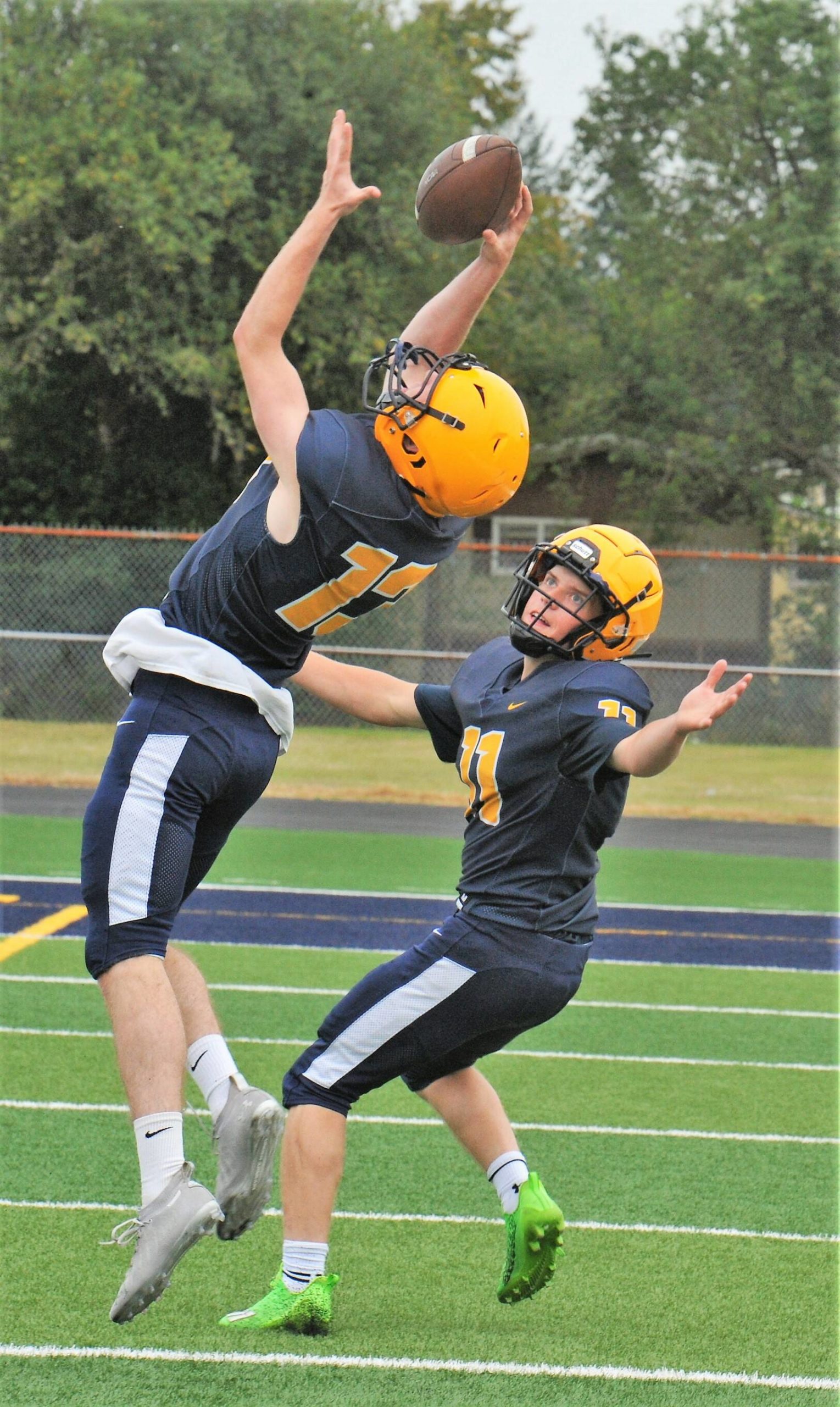 Ryan Rancourt (13) made this interception in front of Kaleb Blanton (11) during this one-on-one practice.