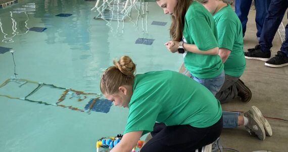 “Forks Whales” team conducts an ROV challenge in the pool.
Forks Whales team conducts an ROV challenge in the pool.