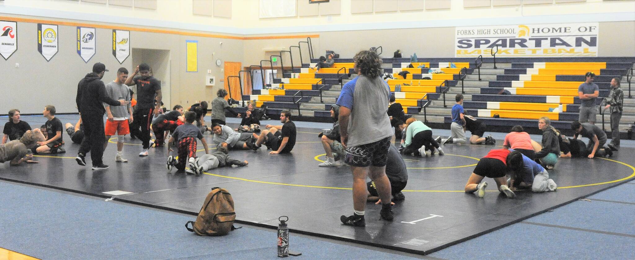 This older group of wrestlers were learning wrestling maneuvers at Spartan Gym Thursday morning. Photo by Lonnie Archibald.