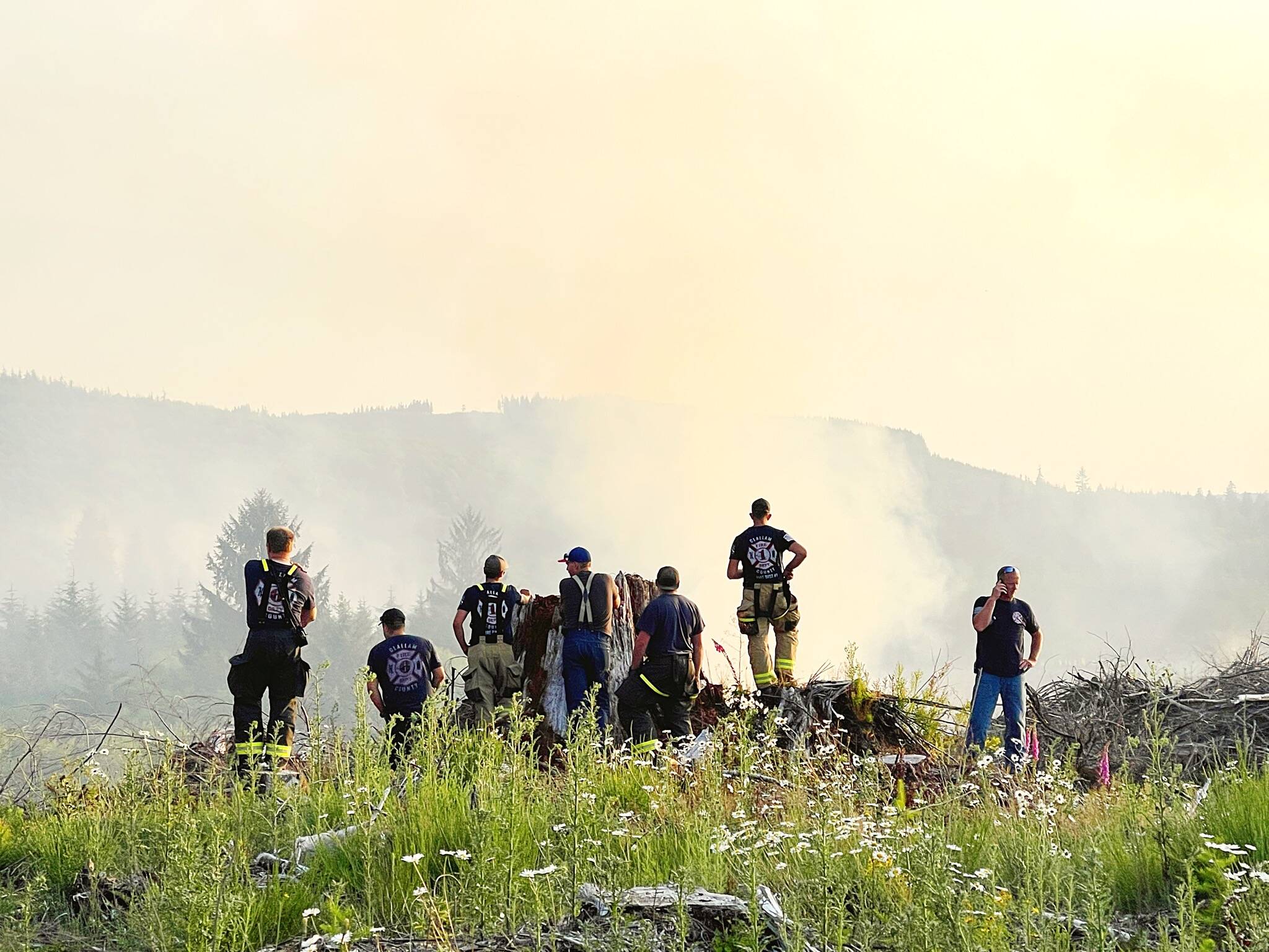 Firefighters take a moment …Photo Mike Z