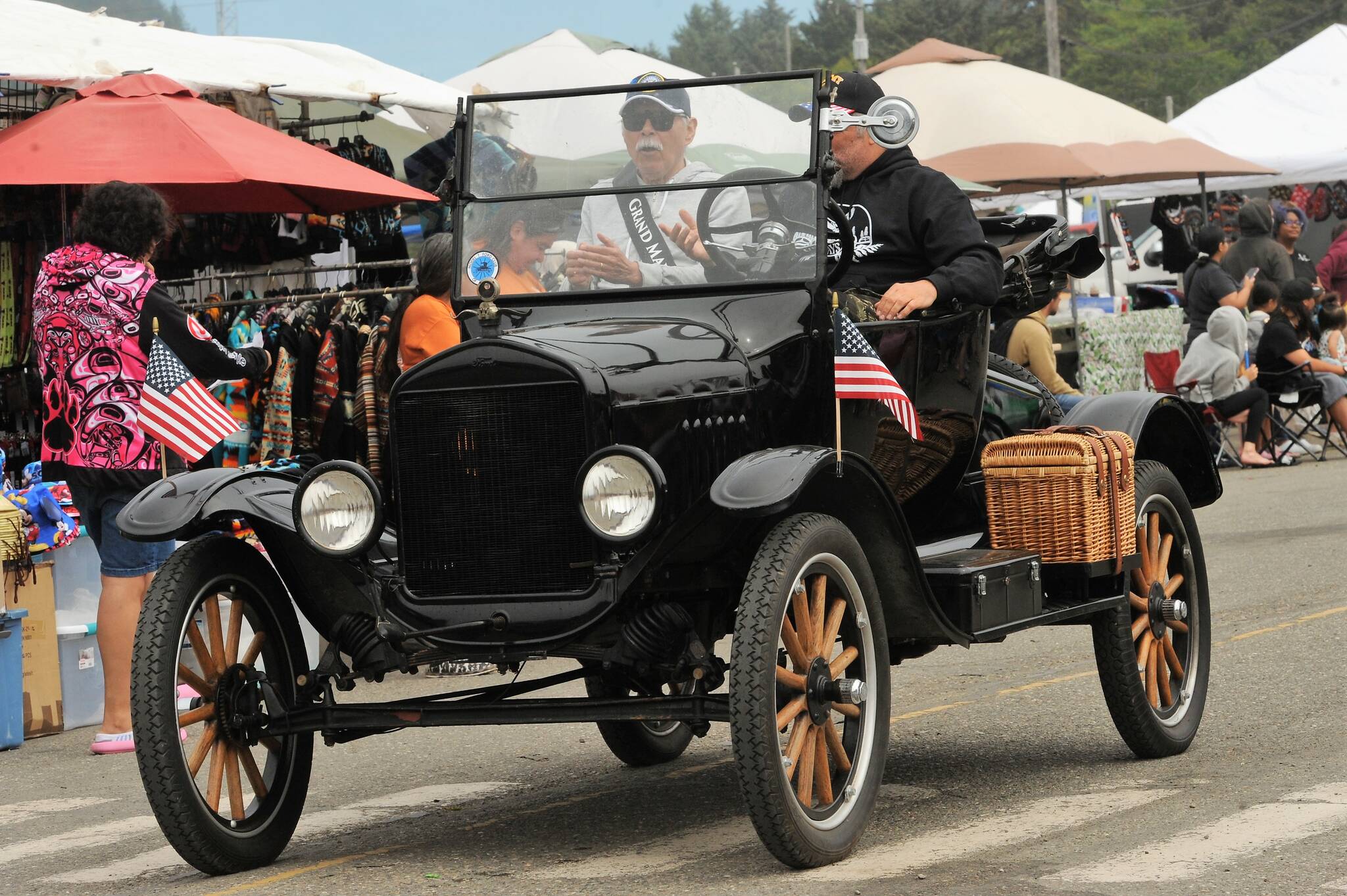 Grand Marshal Bob Bouck rides in a 1921 model T. Photo by Lonnie Archibald