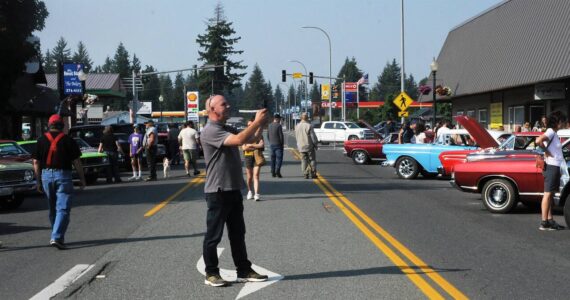 Many visitors took time to photograph the classic vehicles parked on Main street.