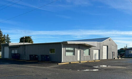 Volunteers and the Olympic Corrections Center crew recently came together to give a new fresh look on the Forks Community Food Bank building. A primer coat and a top coat were applied to the entire building. Submitted photo