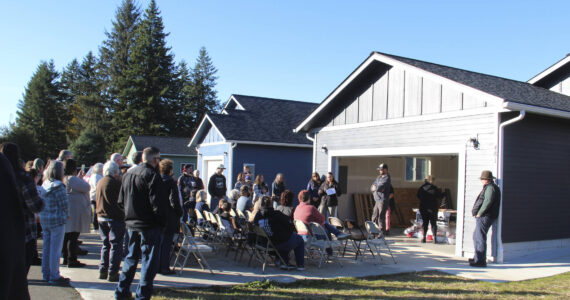 Sunny skies welcomed new homeowners as they were joined by area contractors, family and friends, and Peninsula Housing Authority staff here in front of 481 Maloney Lane; one of the five new homes recently completed and ready to move in, just before Thanksgiving. Photos Christi Baron