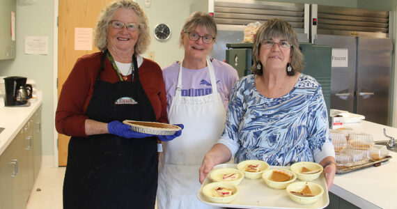 Feeding 5000 volunteers Sherry Schaff, Christie Stallman, and Debbie Anderson show off some of the desserts offered at last week’s Free Lunch at the Forks Community Center. 
Photo Christi Baron