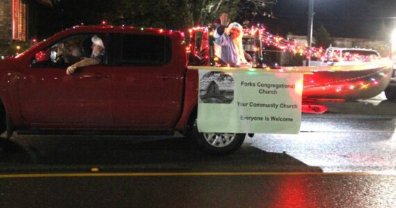 The First Congregational Church joined the fun this year with its first entry in the Twinkle Light Holiday Parade.