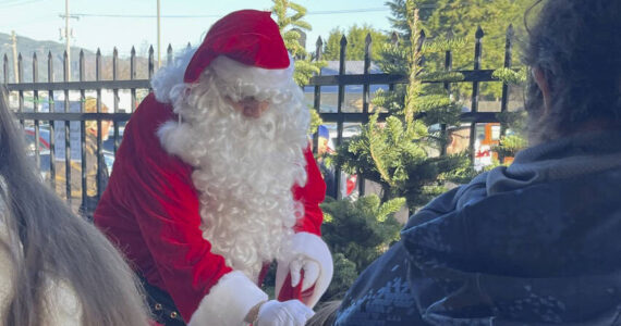 Santa had plenty of candy canes to hand out on Saturday. Photos Christi Baron