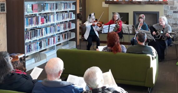 It was a great turnout for the Forkestra Christmas Carol sing-a-long at the Forks Library on Saturday, Dec. 16. About 20 community members joined in the spirit of the season. Thanks to all who attended! Forkestra members participating were Barbara Nowicki, Cynthia Bork, Christi Baron, and Deborah Dillon. Photo Forks Library