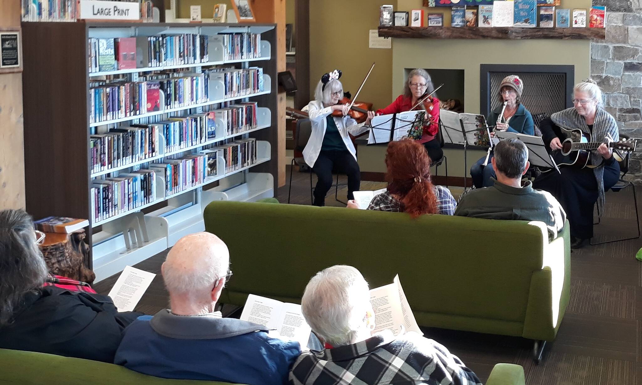 It was a great turnout for the Forkestra Christmas Carol sing-a-long at the Forks Library on Saturday, Dec. 16. About 20 community members joined in the spirit of the season. Thanks to all who attended! Forkestra members participating were Barbara Nowicki, Cynthia Bork, Christi Baron, and Deborah Dillon. Photo Forks Library