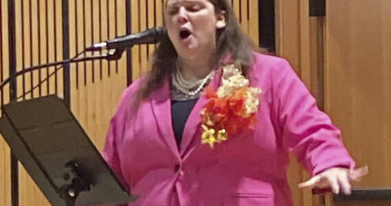 Marni Whitehead of the Rainforest Players performs during the group’s presentation of “The Gift” at the Rainforest Arts Center on December 19. Photo Berlinda James