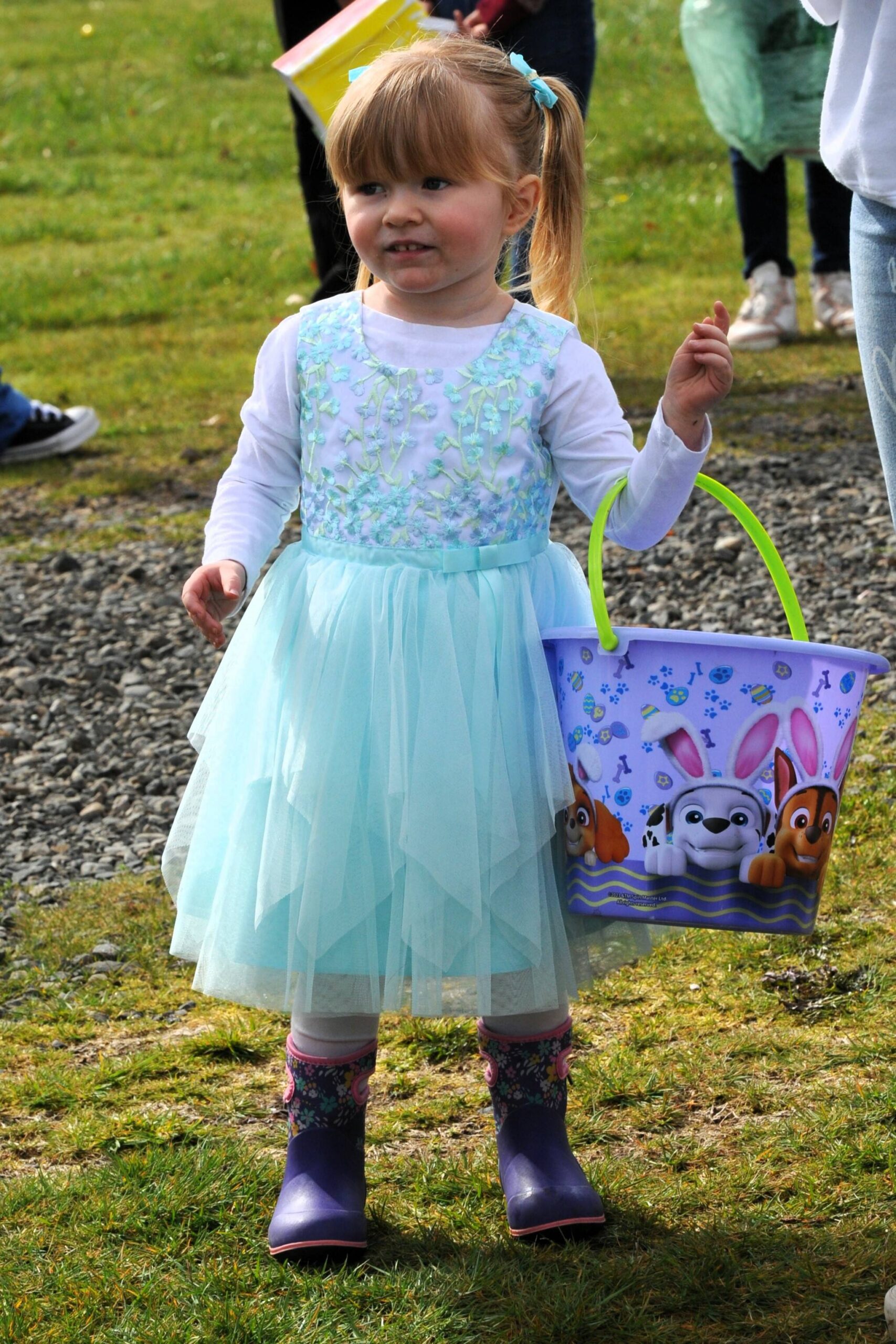 Two-year-old Averliegh Hamilton was ready for the Forks Elks Lodge-sponsored Easter Egg hunt at Tillicum Park on Saturday. Photo by Lonnie Archibald