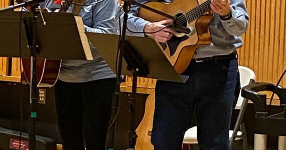 Sally Milici and Roger Lien entertain at the Open Mic Night at the Rainforest Arts Center during Rainfest. Over the weekend, the Rainforest Council for the Arts organized many art-related activities at the RAC. Photos Berlinda James