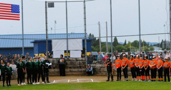 The Charge and the Orioles teams were just two of the eight teams who participated in the well-attended annual Kenny Church Memorial Tournament held at Duncan Fields in Forks. This photo was during the beginning of the opening ceremony, as all teams walked onto the field.