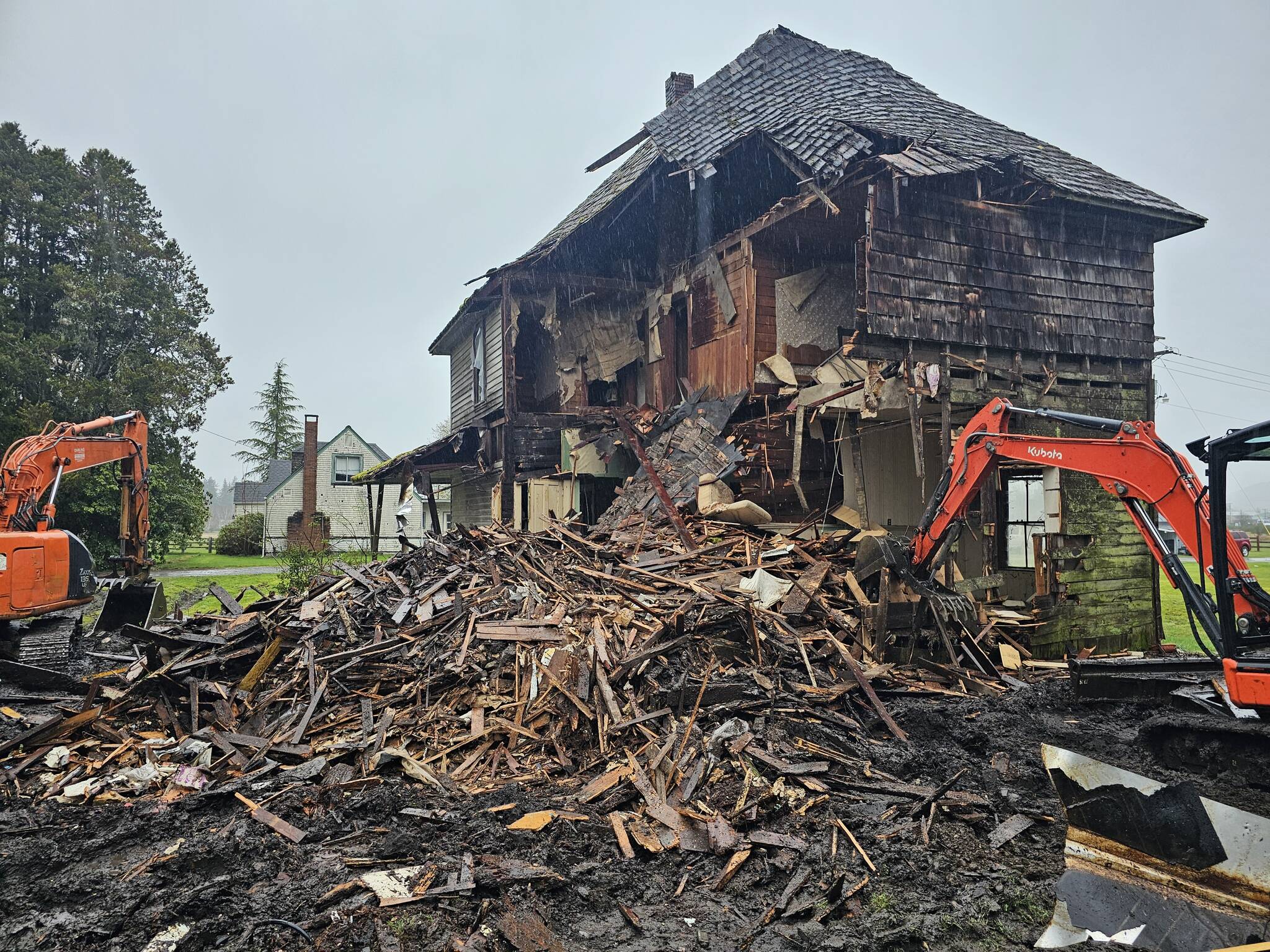 Salish Excavation and Trucking hauled away 26 loads of material from the old house. Doors and woodwork were removed prior to demolition. The contractor reported that the area was leveled and prepared for a future vacation rental. Photo Salish Excavation and Trucking