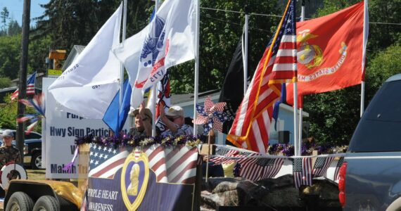The Makah Tribe veterans float honoring all veterans was one of many Makah entries during Saturday’s Fun Days Parade. Photo by Lonnie Archibald. More photos page 7.
