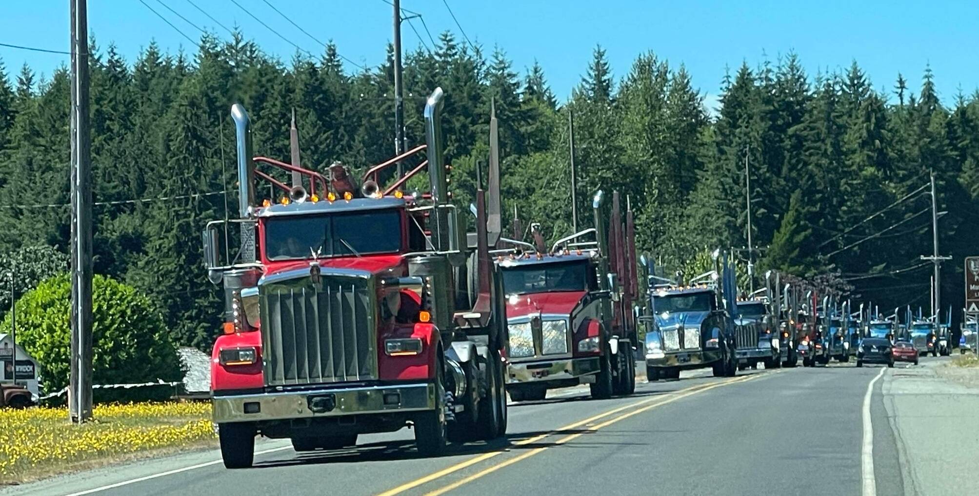 On Saturday afternoon a truck procession of almost 50 trucks paid tribute to fellow truck driver Paul Haugh. The trucks were escorted by law enforcement through town and then proceeded to the Forks Elks Lodge for Paul’s celebration of life. Photo Mike Zavadlov