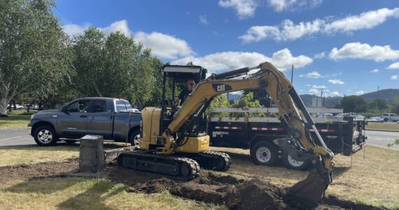 Last week Richard Halverson assisted the Bogachiel Garden Club (BGC) with a project at the Forks Transit Center. The little excavator made quick work of an overgrown flowerbed that will be replaced with a raised brick bed. BGC president Janet Hughes is in charge of the project. Photos Christi Baron