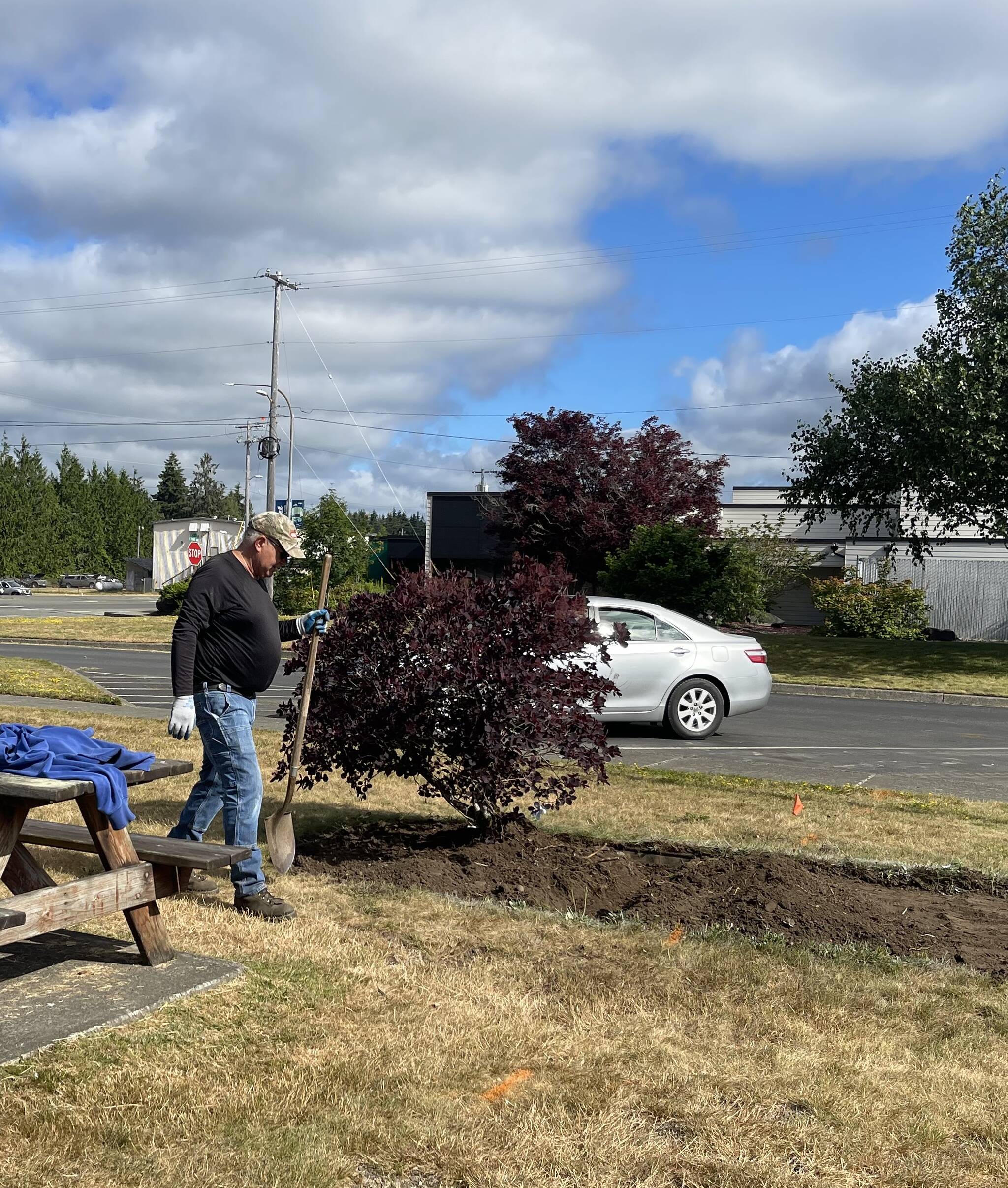 Assisting Richard was Pastor Warren Johnson who did some shovel work around the Smoke Bush that was planted in memory of Marine Pfc. Jason Hanson. Jason died July 29, 2006, Serving During Operation Iraqi Freedom. The Smoke Bush will remain as well as another tree at the other end of the raised bed.