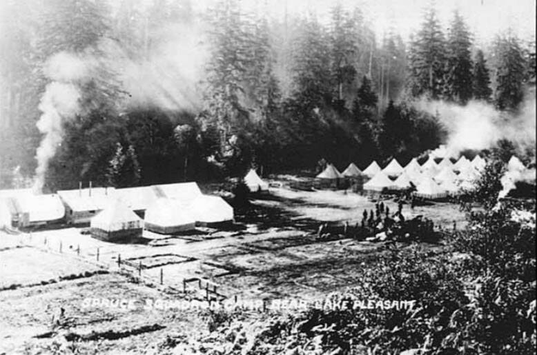 In 1918, the Beaver-Tyee area grew as hundreds of soldiers called the Spruce Division arrived and set up camp at the south end of Lake Pleasant. The contractor, Siems Carey, represented by H.S. Kerbaugh, was awarded the contract to remove 250 million board feet of spruce. Siems Carey built barracks, a mess hall, offices, a dance hall and post office — and even changed the name of the community to Siems Carey. In 1919 the name changed back.