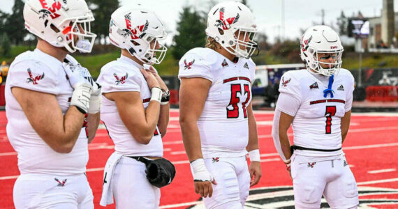 Courtesy Eastern Washington Athletics Forks’ Luke Dahlgren, second from right, shown during a pregame coin flip during the 2023 season, has been selected as a captain for the second straight season for the Eastern Washington football team.