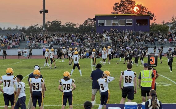 A bit of a smoky sky and sunset could be seen in Sequim as the Spartans took on the Wolves on Friday evening. Photo Sarah Hanson