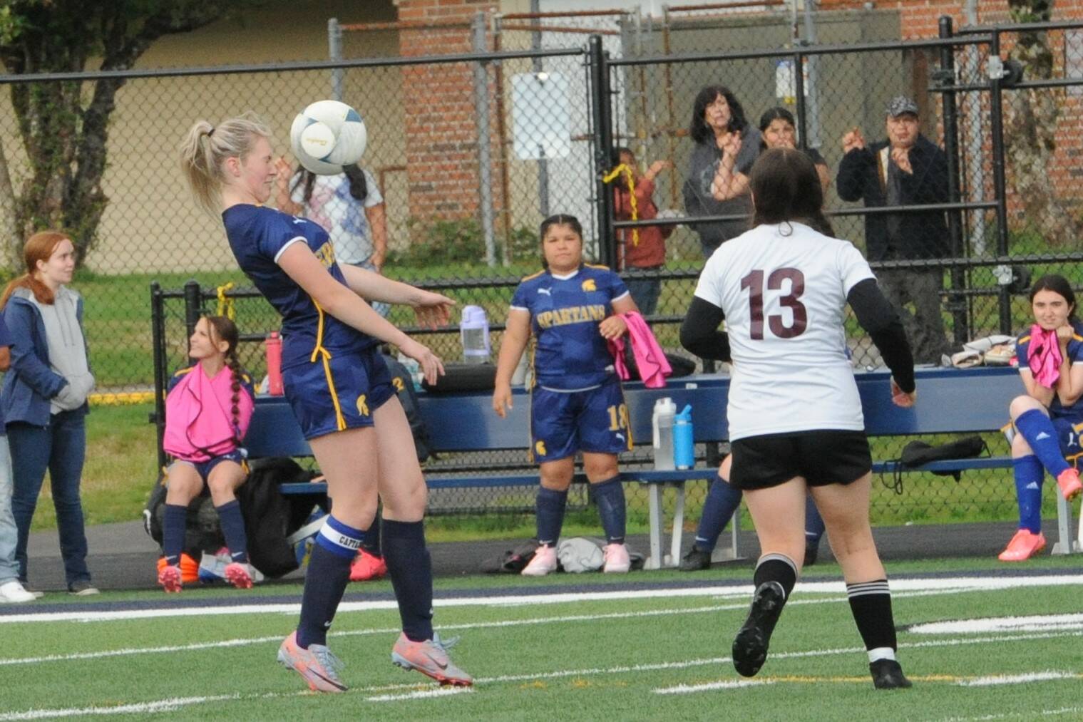 Forks’ Miley Blanton keeps her eye on the ball against Raymond-South Bend on Sept. 11 at Spartan Stadium where the Ravens defeated the Spartans 5 to 0 in this league contest. Photo by Lonnie Archibald