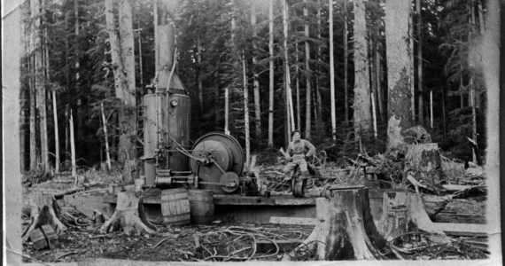 There will be two chances to enjoy a narrated video presentation of logging history on Oct. 11 and 12 at West End NOLS branches. Here an unidentified man is seated on a single-drum donkey engine, Forks. Late 19th to early 20th century; Bert Kellogg Collection.