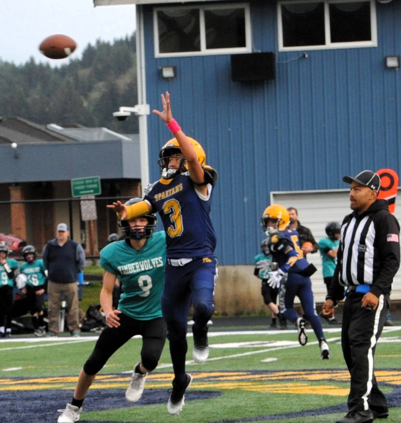 Spartan Ryder Fletcher reaches for a high pass against the Timberwolves who defeated the Spartans 25 to 13 in middle school action at Spartan Stadium.
Photo by Lonnie Archibald