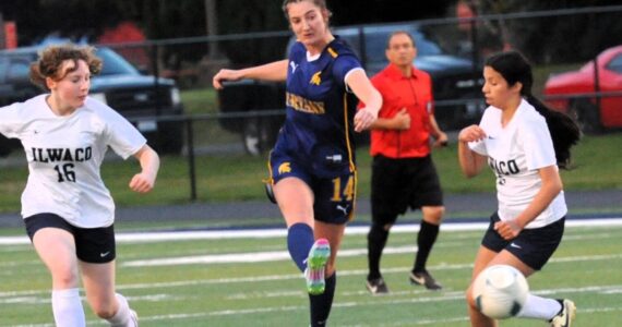 Spartan Molly Hampton controls the ball between Ilwaco players at Spartan Stadium where Forks defeated the Fishermen 4 to 0. Photo by Lonnie Archibald