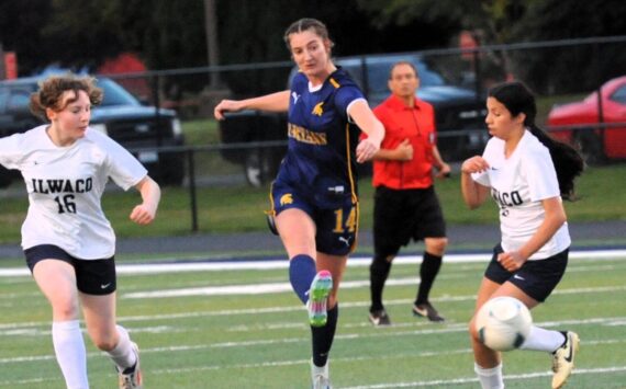 Spartan Molly Hampton controls the ball between Ilwaco players at Spartan Stadium where Forks defeated the Fishermen 4 to 0. Photo by Lonnie Archibald