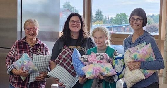 Girl Scout Troop 41844 presented pillows to Soroptimist International of the Olympic Rain Forest at their October meeting. The Girl Scouts made the pillows at Ginger’s Closet sewing room. They will be part of the comfort kits SIORF assembles and donates to children in emergency foster placement.
Pictured: Sharla Fraker, SIORF, Alyssa Brickey, GS leader, Mackenzie Brickey, GS, and Cindy Mesenbrink, SIORF. Submitted photo