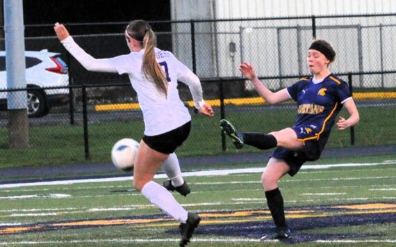 Spartan Allie Coons kicks past Adna who defeated Forks in this league contest at Spartan Stadium. Photo by Lonnie Archibald