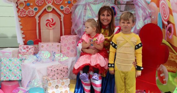 Evergreen 76 was a Candyland Dream! Here Devennie and grandkids get ready for the event to begin. Photos Christi Baron