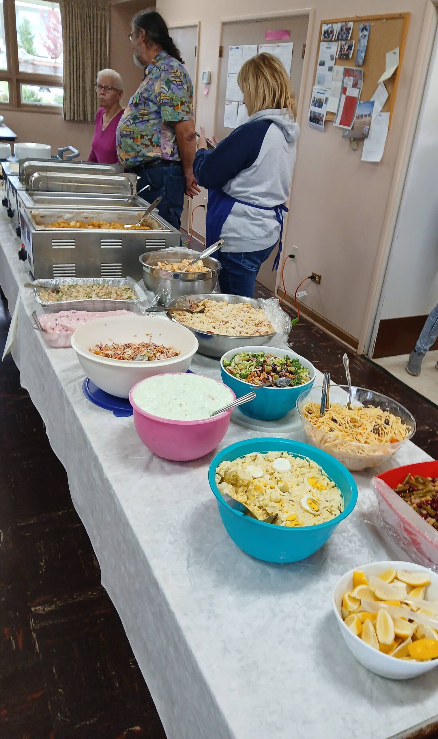 Volunteers were ready for hungry community members as the 89th annual Harvest Dinner was just ready to get underway earlier last month. Pastor Warren Johnson reported that well over 300 meals were served.
The proceeds from this dinner help out with the cost of the nonprofit groups that meet at the church, which are many. Photo Ron Miller