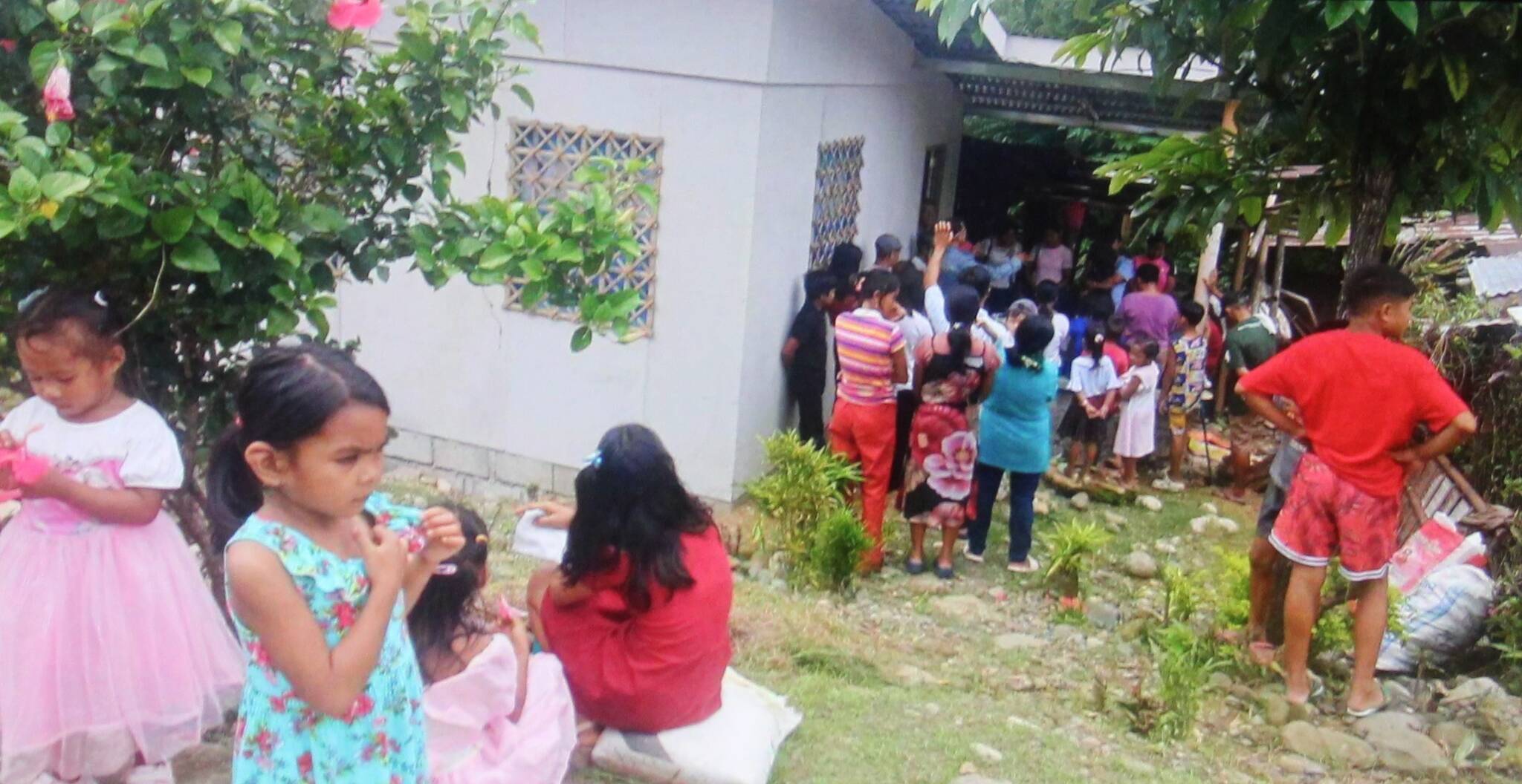 House warming at one of the three houses that were built.