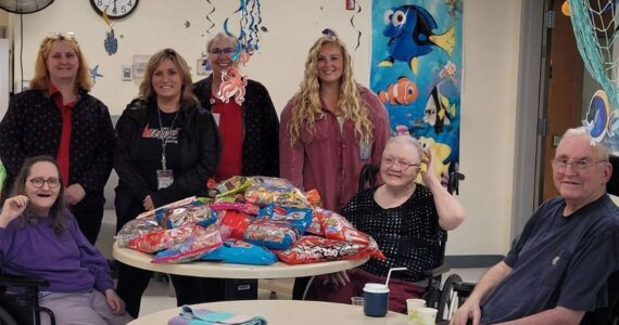 Lori Capp and Jaime Henry proudly deliver 60.55 pounds of candy to LTC, to be passed out on Halloween, as part of Olympic Correction Center’s Combined Fund Drive initiative. OCC staff brought in candy to earn bingo cards, playing a progressive game to win coffee cards from team donations—making fundraising a little sweeter! Submitted photo