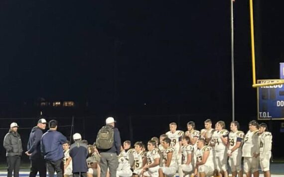 Spartan coaches address the team as they played their last game in post action. Photo Amber Ramsey