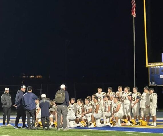 Spartan coaches address the team as they played their last game in post action. Photo Amber Ramsey