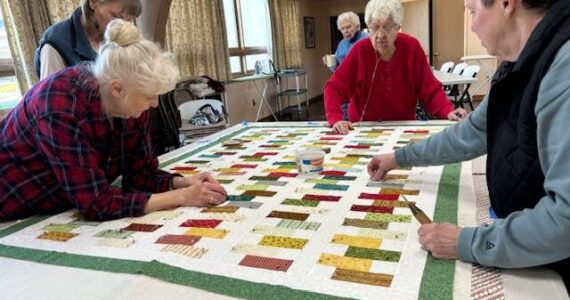 Piecemakers Quilt Club spent last Friday pinning quilts. Once the quilts are finished, they will be shipped to hurricane victims in Asheville, North Carolina. Join us if you are interested in learning to quilt. Our next meeting is on January 14, 2025 at 6:30 p.m., at the Congregational Church. Submitted photo