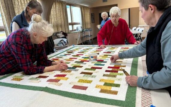 Piecemakers Quilt Club spent last Friday pinning quilts. Once the quilts are finished, they will be shipped to hurricane victims in Asheville, North Carolina. Join us if you are interested in learning to quilt. Our next meeting is on January 14, 2025 at 6:30 p.m., at the Congregational Church. Submitted photo