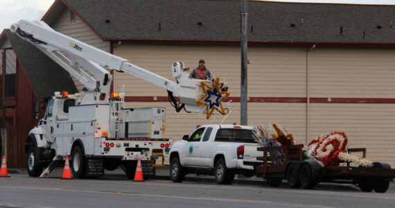 The City of Forks Crew installed the new West End Business and Professional Association Christmas decorations on Monday, November 25! New decorations were purchased with a City of Forks lodging tax grant. Photo Christi Baron